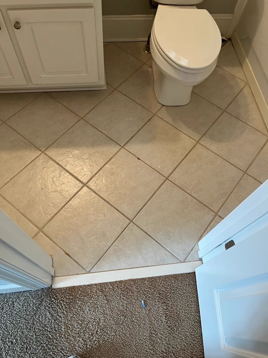 Dated restroom before a commercial venue renovation, Metro Atlanta