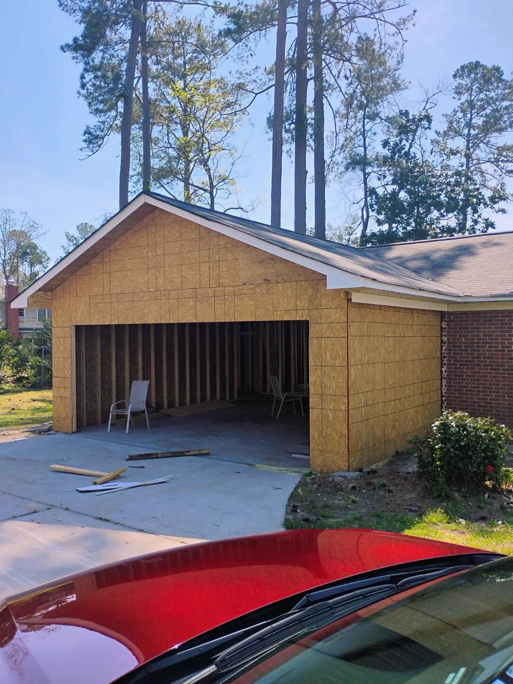 Detached garage addition nearing completion beside the existing house, Metro Atlanta