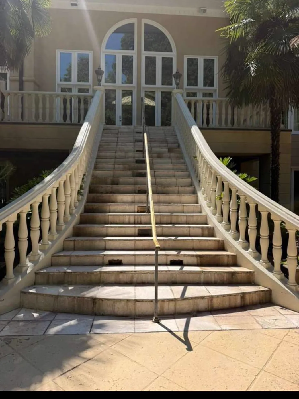 Exterior staircase stripped to its framing before rebuilding, Metro Atlanta