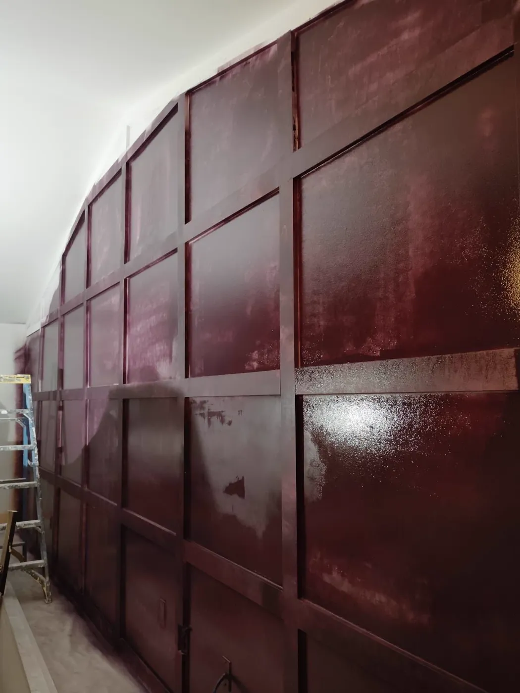 Finished burgundy panelled feature wall with a high-gloss finish, Metro Atlanta